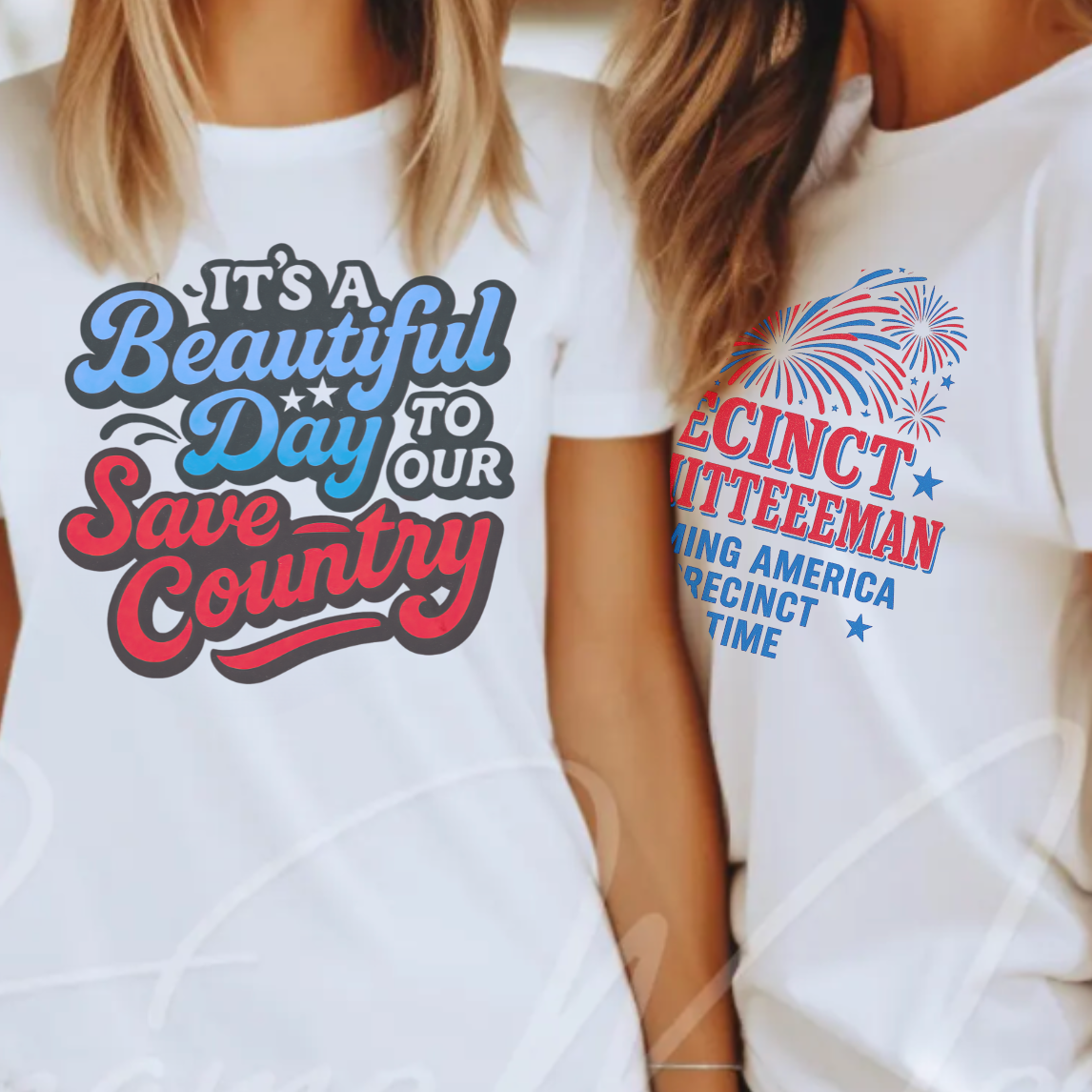 Two women wearing white t-shirts with patriotic designs, standing side by side.